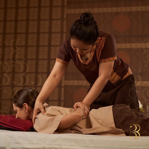 Traditional Thai massage with gentle stretching techniques